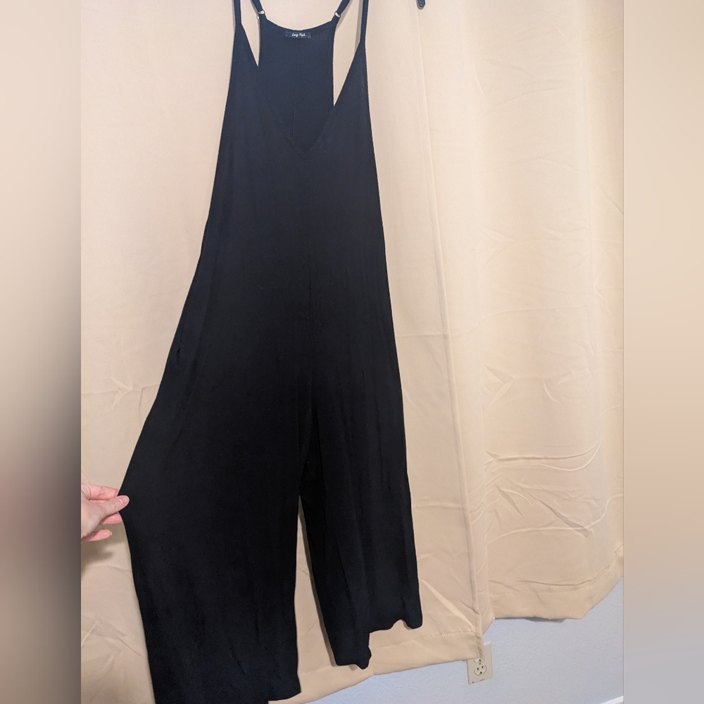 Black v neck wide leg jumpsuit